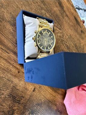 Gold Tone Chronograph Watch with Black Dial